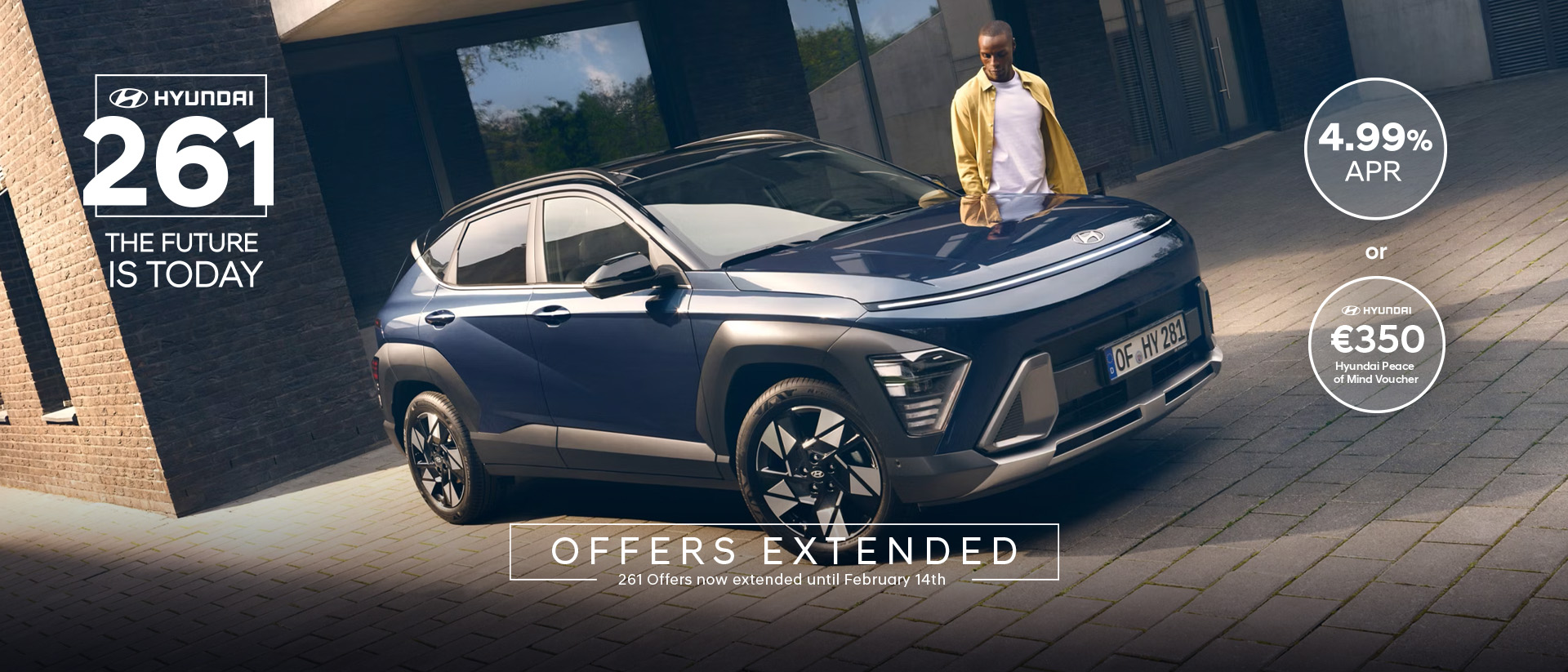 The all-new Hyundai KONA in blue parked next to a men with yellow shirt.